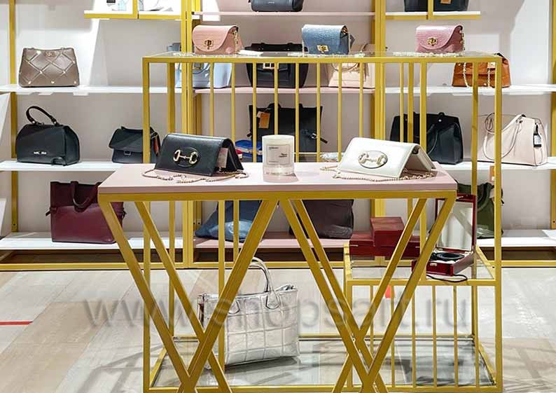 Торговая мебель в магазинах сумок Фото