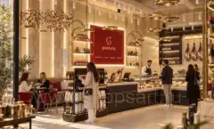 Интерьер гастробутика с витринами и зоной кафе